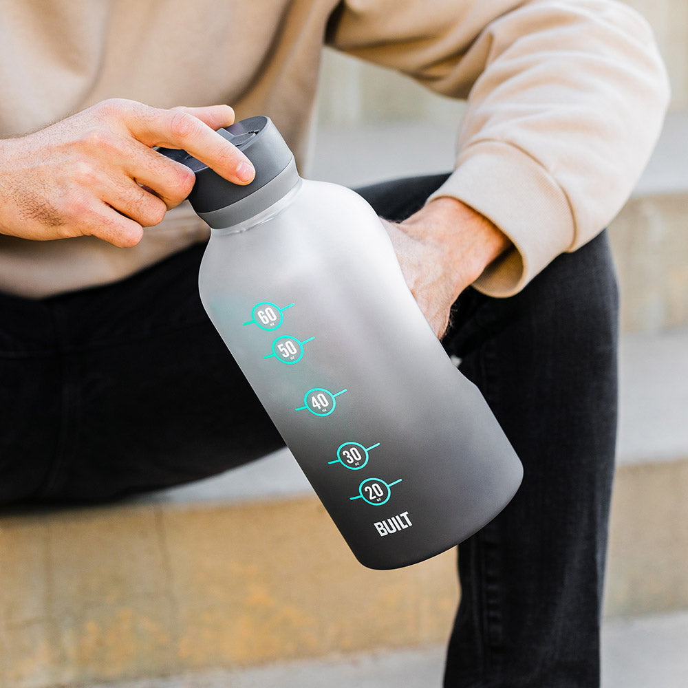 built-74oz-motivational-water-bottle-with-straw-lid-and-time-markers image 2