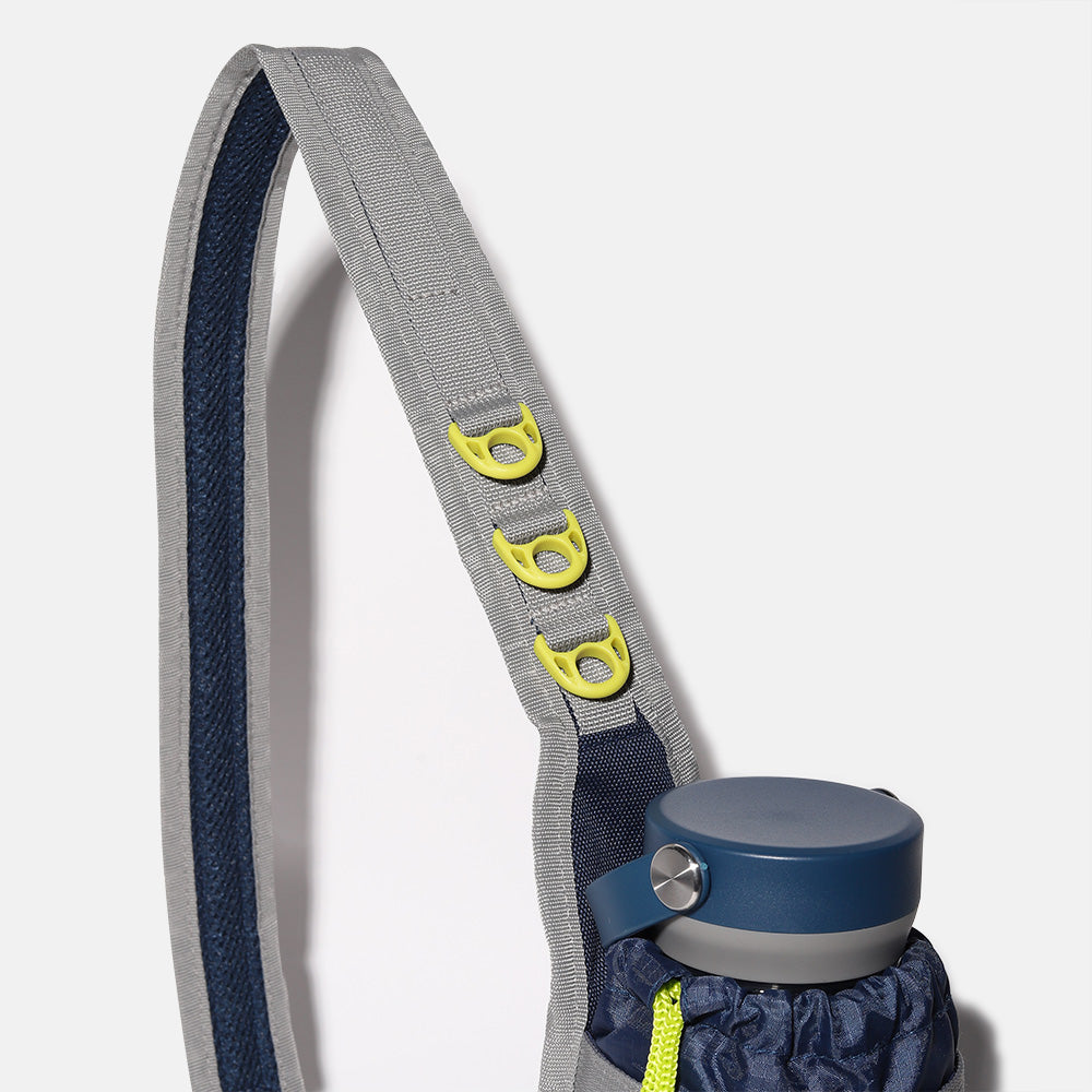 built-dog-excursion-bottle-sling-navy-and-lime-3-zipper-compartment-dog-walking- image 3